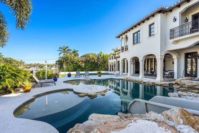 Luxury Mediterranean Estate in Exclusive Gated Community in Fort Lauderdale. Deep Water Frontage for Mega Yacht. Double Lot. NBA Basketball Court. Swimming Pool With Grottos and Water Slide.