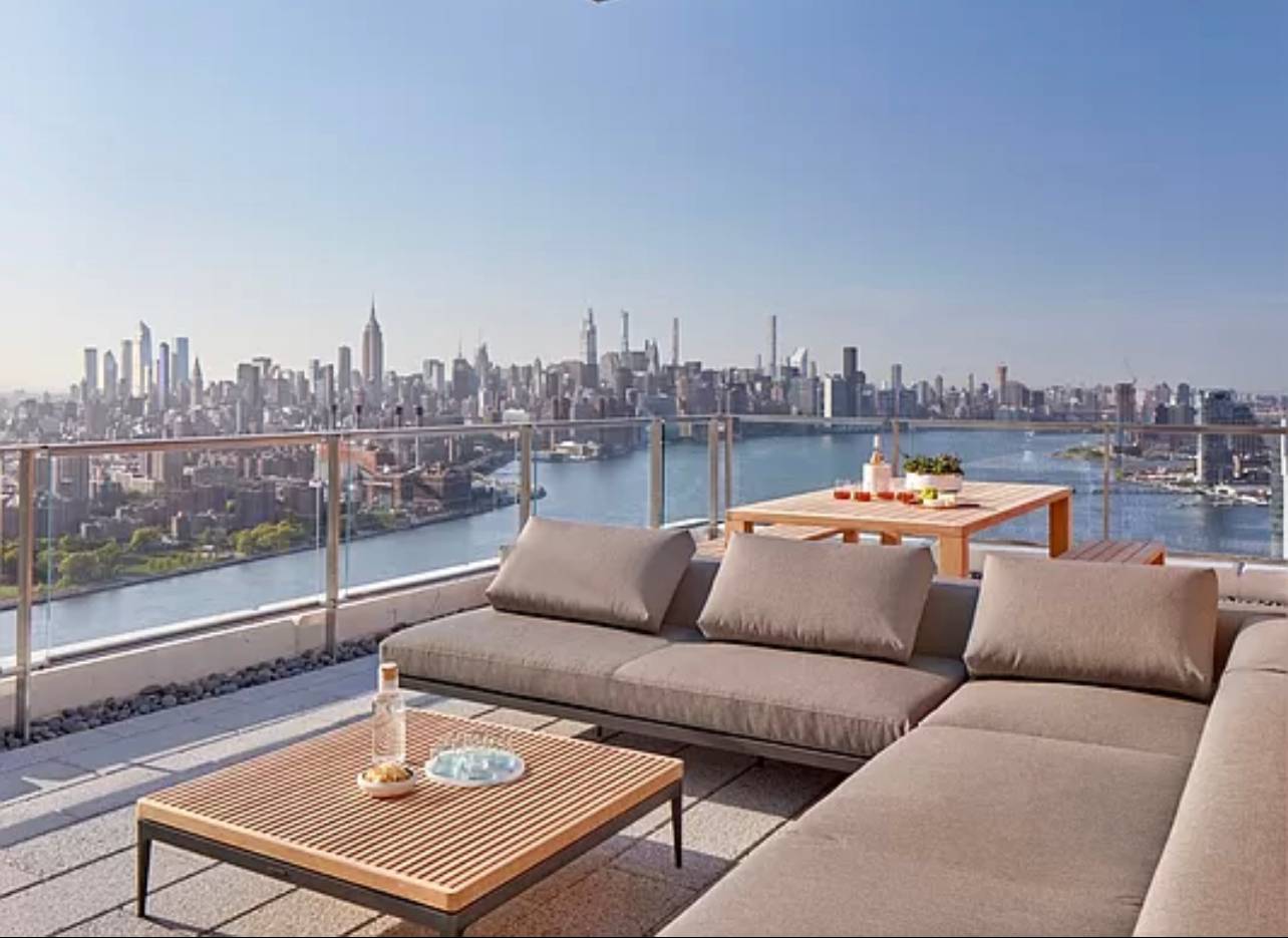 Live above it all in the most desirable building in Williamsburg!