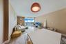one-miami-east-3110-open-living-dining-room-kitchen-hardwood-floors