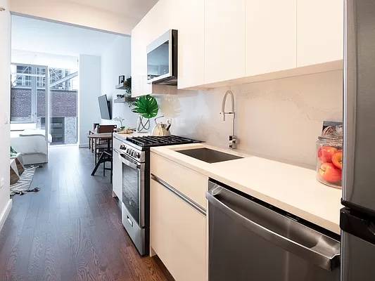 Brand New Luxury Studio | Open Kitchen | Condo-level Fixtures | Central AC | Washer + Dryer | High Ceilings | Keyless Entry