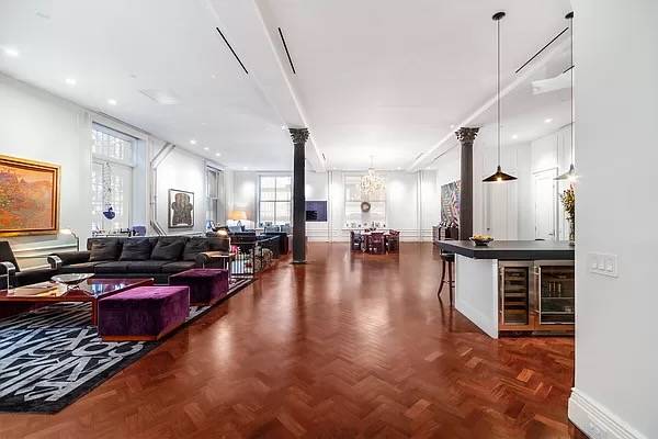 4BR stunning SoHo loft spans gracious proportions with 5000 SF and 14.5 ft ceilings on the corner of Prince and Broadway