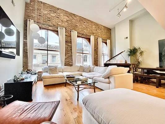 Meticulously Renovated 2 Bedroom, 2.5 Bathroom Duplex Penthouse with a Private Rooftop Located in the heart of Tribeca