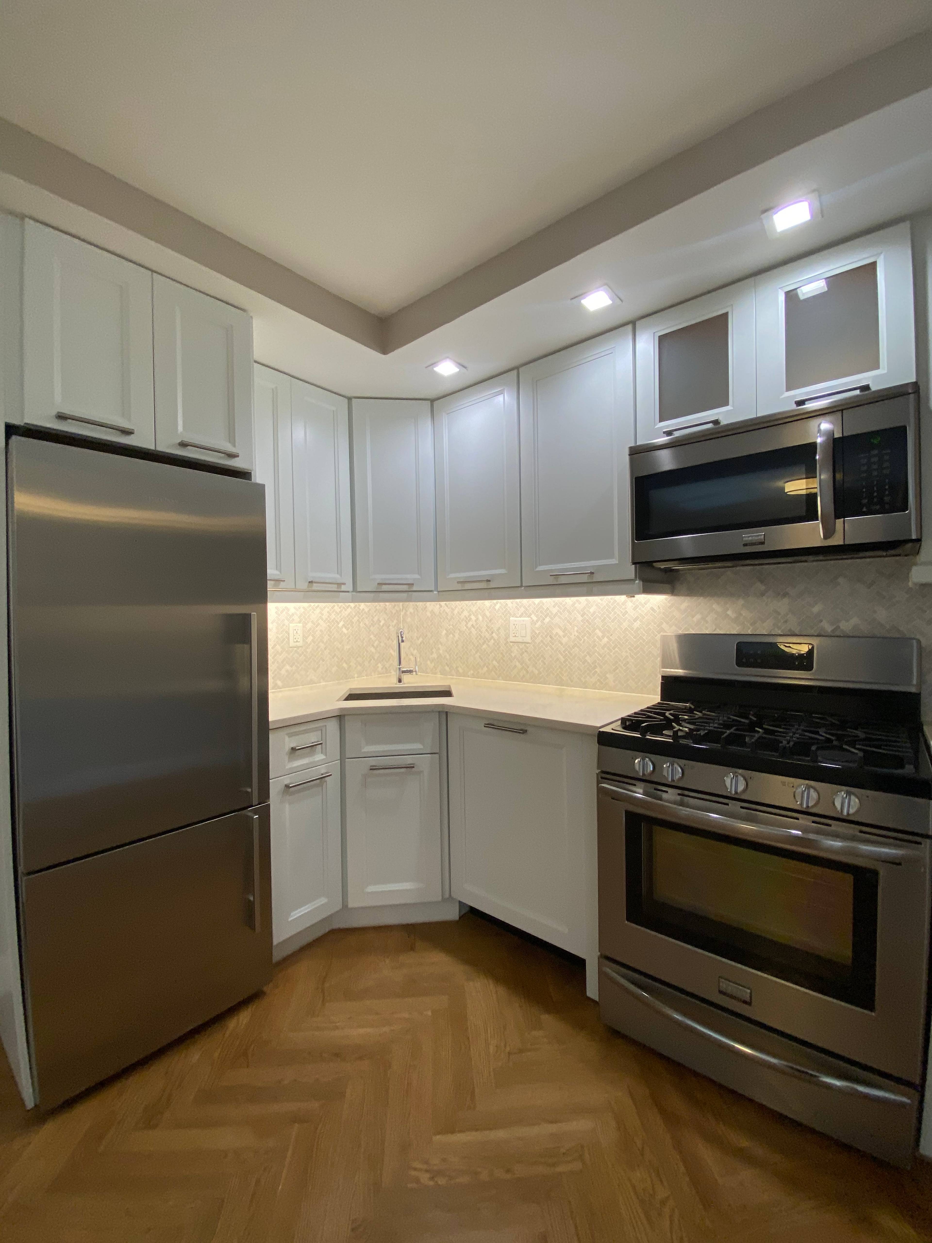 Upper East Side gut renovated 1 bedroom flex 2 with home office, 2 Bathrooms, Balcony, W/D, No Fee