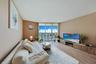 one-miami-east-3110-living-room-bay-view-floor-ceiling-glass-hardwood