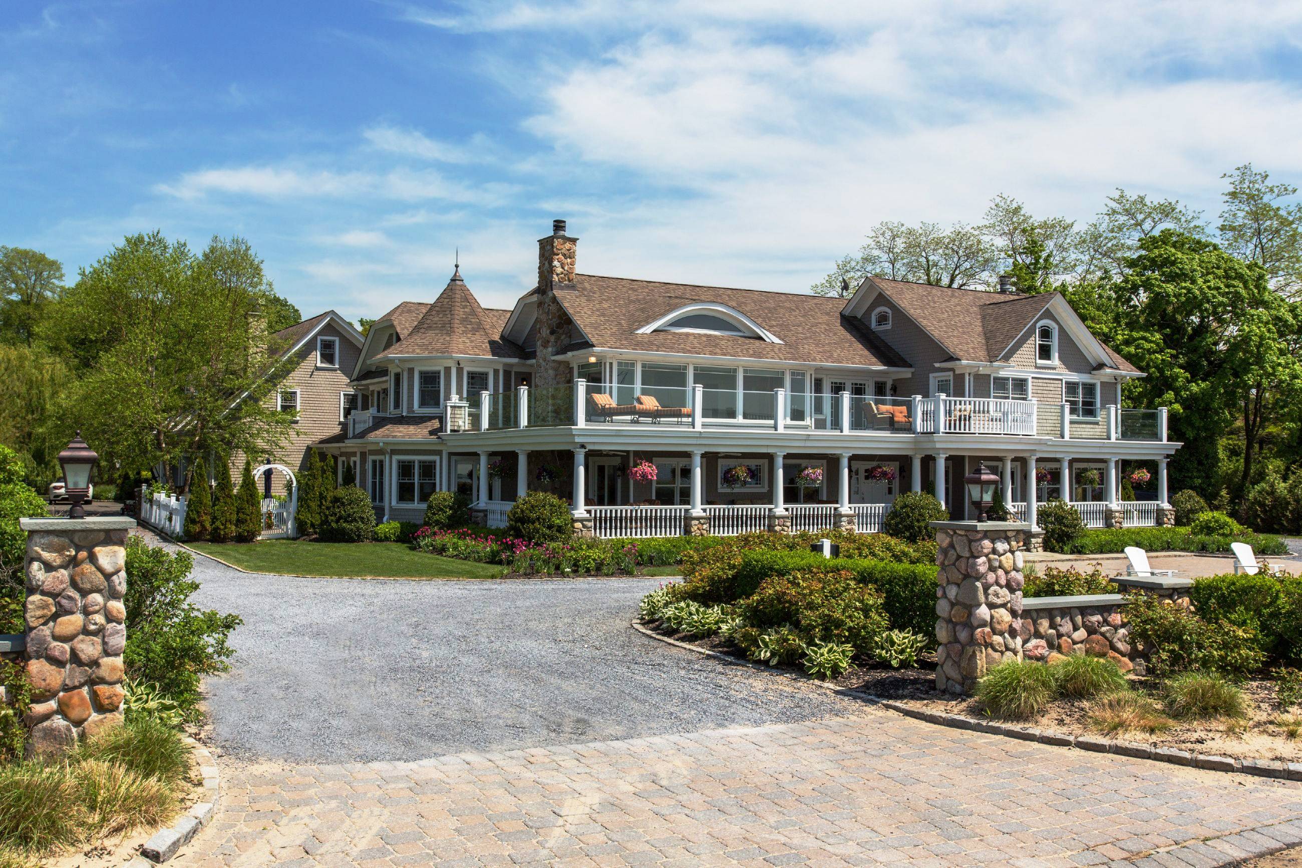 Stunning Waterfront Estate with NYC Skyline Views sits privately on 2+ acres