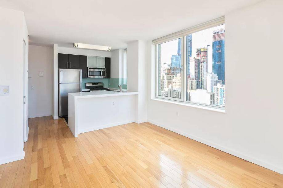1 Bed 1 Bath | Open Kitchen | Floor to Ceiling Windows | Marble Bathroom | Washer + Dryer | Central A/C | Built in Speakers | Luxury High-rise