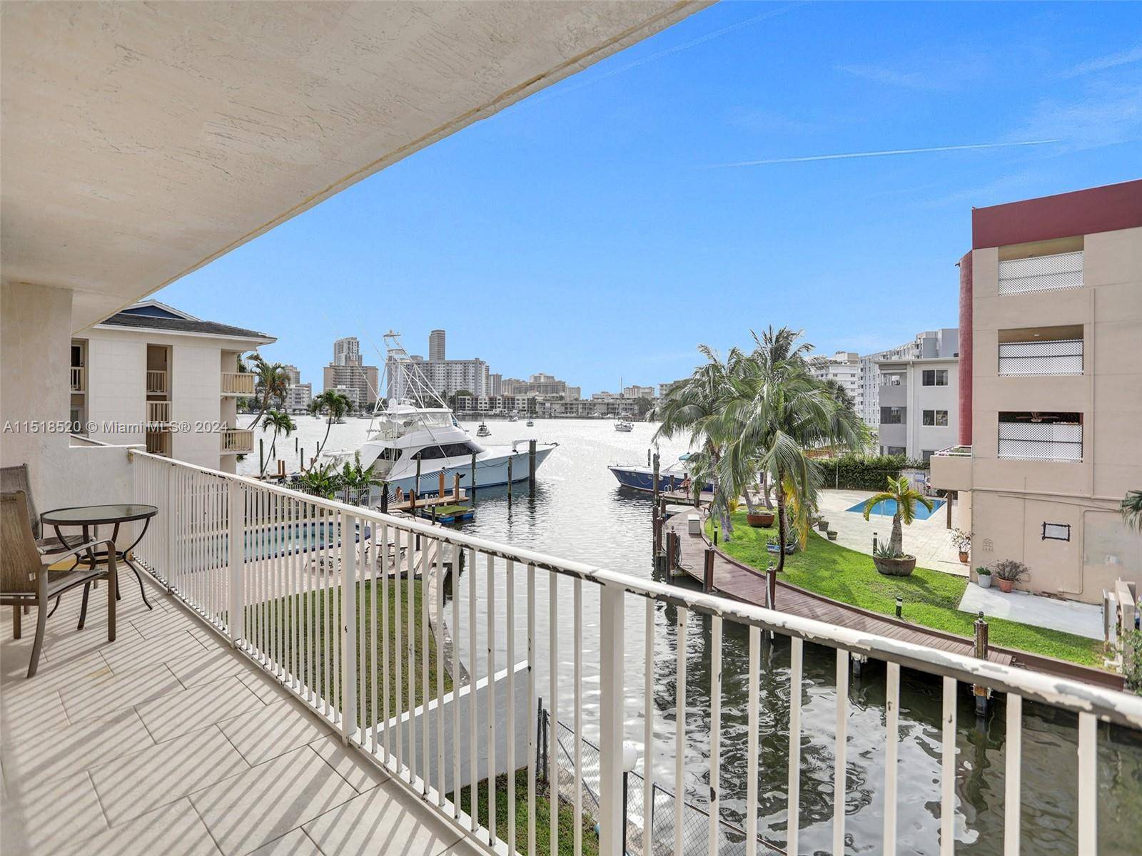Beautiful Water Views from the living area, bedroom, and wraparound balcony are just part of the charm of this updated spacious condo.