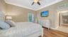Another view of primary bedroom