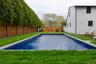 View of pool featuring a fenced backyard and a patio area