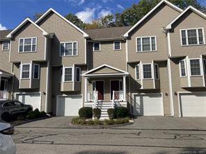 This desirably located townhouse is tucked away in an small 15 unit enclave that is close to downtown Wallingford.