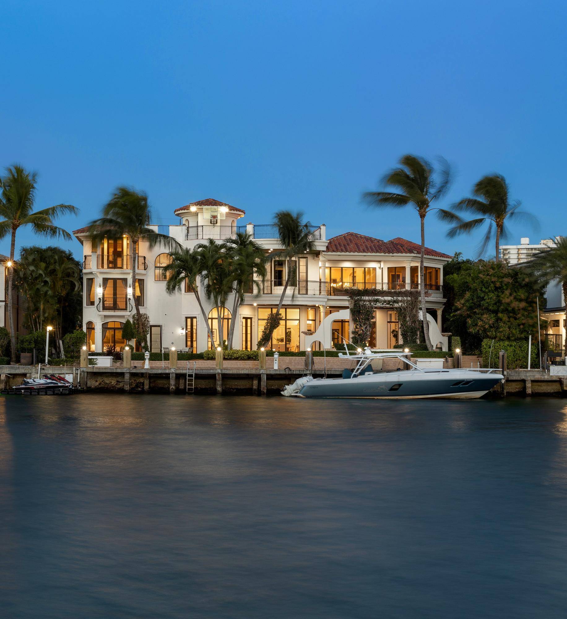 Re mastered Spanish Colonial inspired Intracoastal estate sited on 115 feet of ''no wake'' waterfrontage, just off prestigious Lake Boca Raton.
