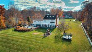 Spectacular Estate like setting nestled on over two acres within the private confines of Killingworth and a mere 20 minutes to Madison s Town Center and Beaches.