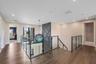 Glass rails on stairs and around the loft