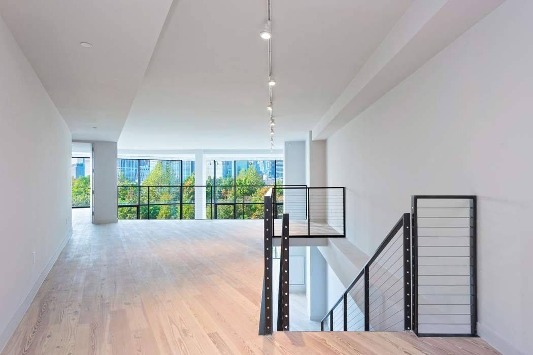 This magnificent 4 bedroom, 3 bathroom duplex home with sprawling views looking upon Statue of Liberty, the East River, Brooklyn Bridge Park, newly built marina and the NYC Downtown Skyline.