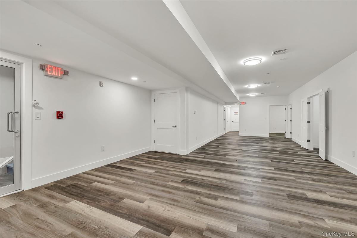 Finished below grade area with wood finished floors