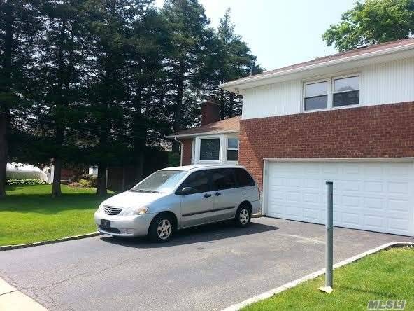 Mint condition 3 BR 3 Full Bth Split with 2car garage in syosset SD