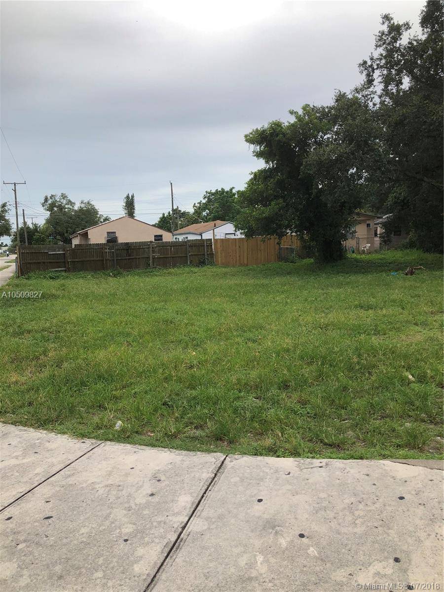 High Traffic Corner Lot 8700 SQ FT Ready for development on the busy 46th Street.