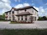 Welcome Home! Gorgeous mediterranean style estate set on almost 3/4 acre. Custom circular paver driveway with fountain.