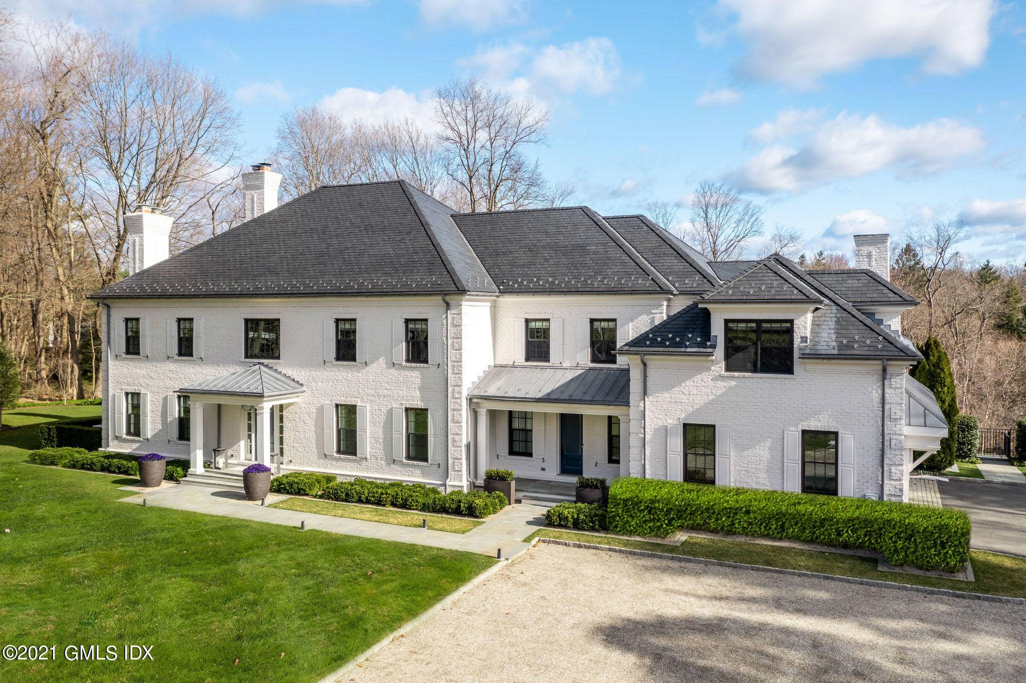 Sophisticated and stunning Georgian colonial, beautifully sited on 2.