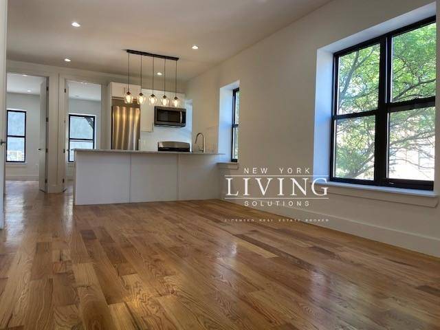 Available August 1. A beautiful, newly renovated 4 bedroom 2 bath apartment in the heart of Crown Heights with PRIVATE ROOF DECK !
