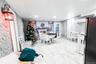 Dining room featuring marble finish flooring and wallpapered walls