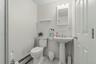 Bathroom #3 is conveniently located in the recreation room area.