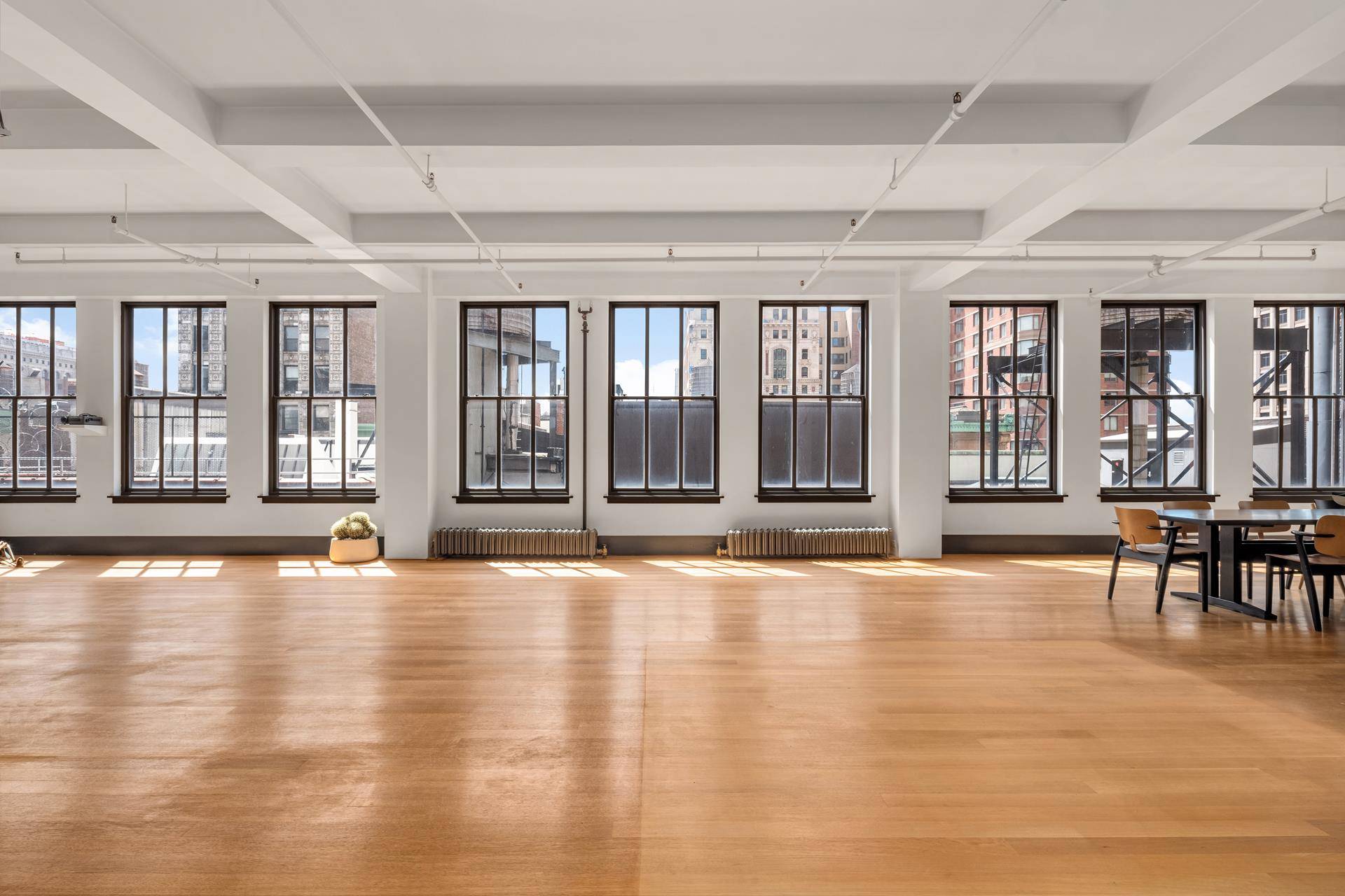 Truly one of a kind 5, 500 square foot PRE WAR PENTHOUSE LOFT just a block away from Madison Square Park This expansive full floor loft with four exposures and ...