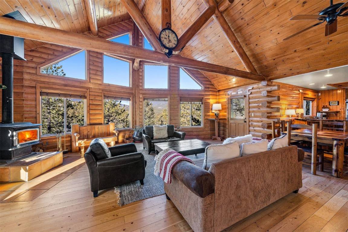 Experience tranquility in this 5 acre mountain home in Bailey, Colorado.