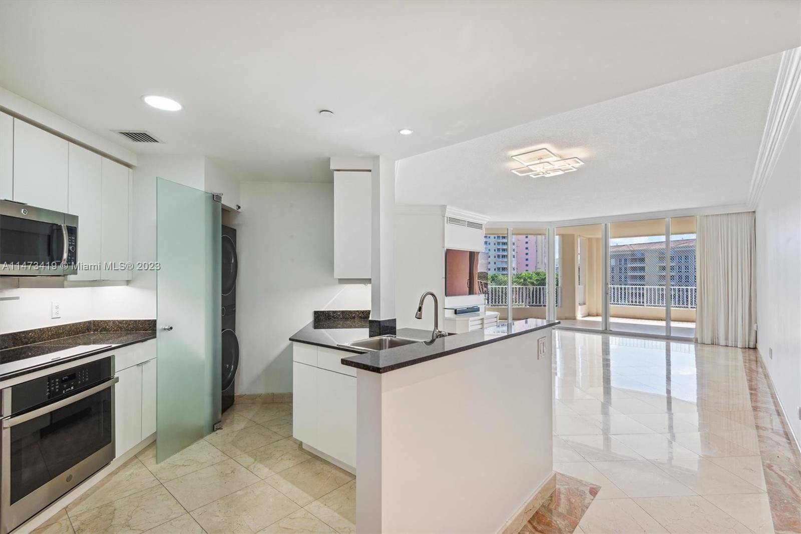 Discover luxury living at its finest in this quant two bedroom, two bathroom Penthouse residence at Resort Villa II in The Ocean Club, Key Biscayne.