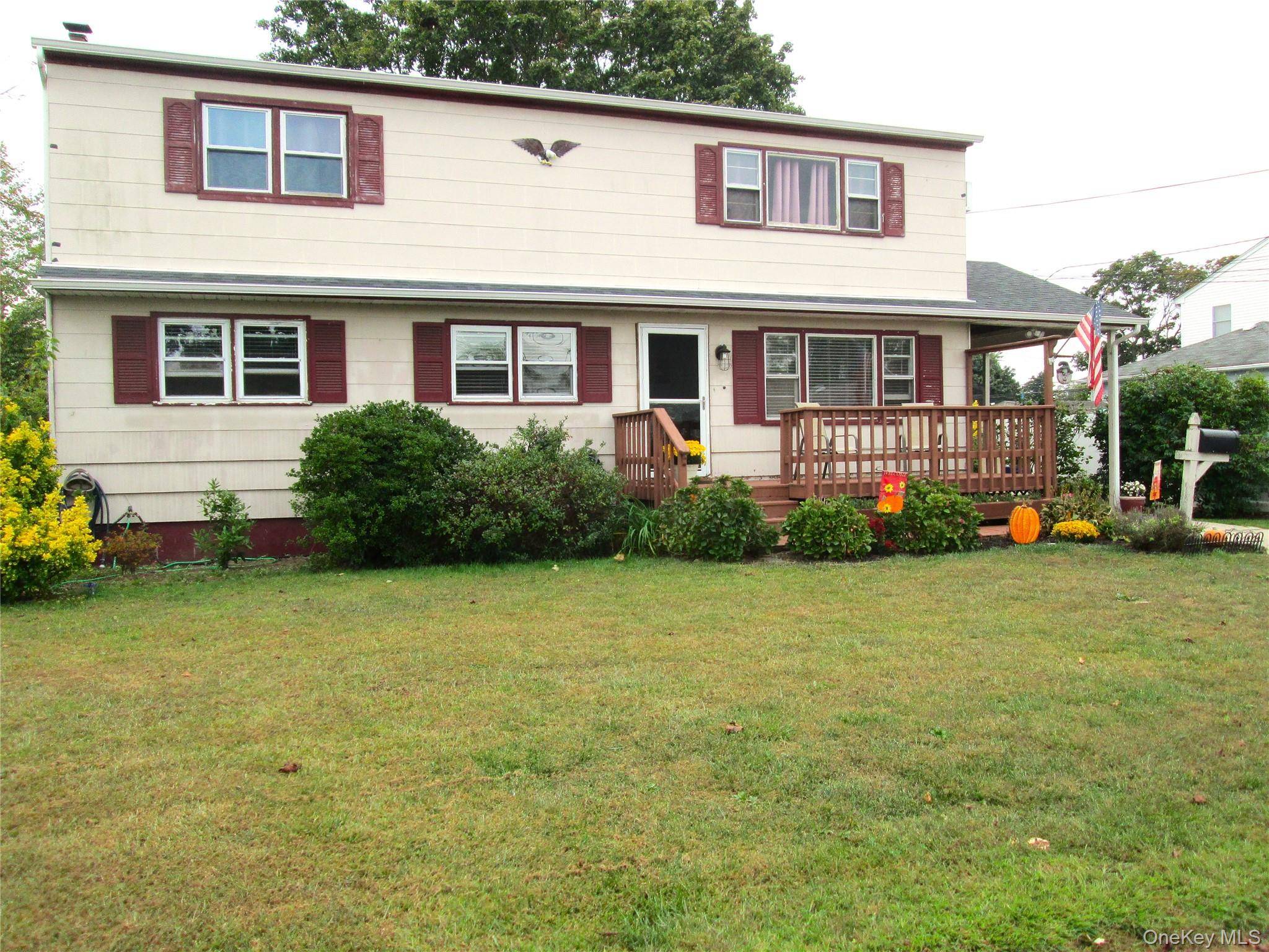 Welcome to this spacious home with accessory apartment with proper permit, located in Lindenhurst.