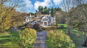 Sophisticated, Quiet and Privacy on one of the most desirable streets in New Canaan !
