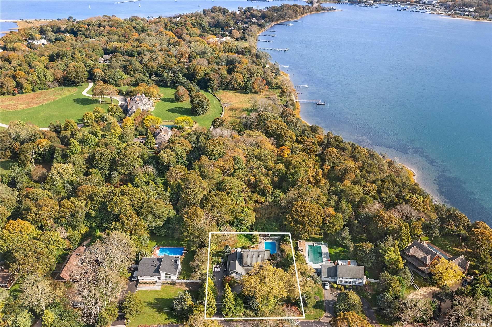 Located on a quiet cul de sac in North Haven Village, this 4 bedroom, 2 1 2 bath home has your own private dock directly on Sag Harbor Cove with ...