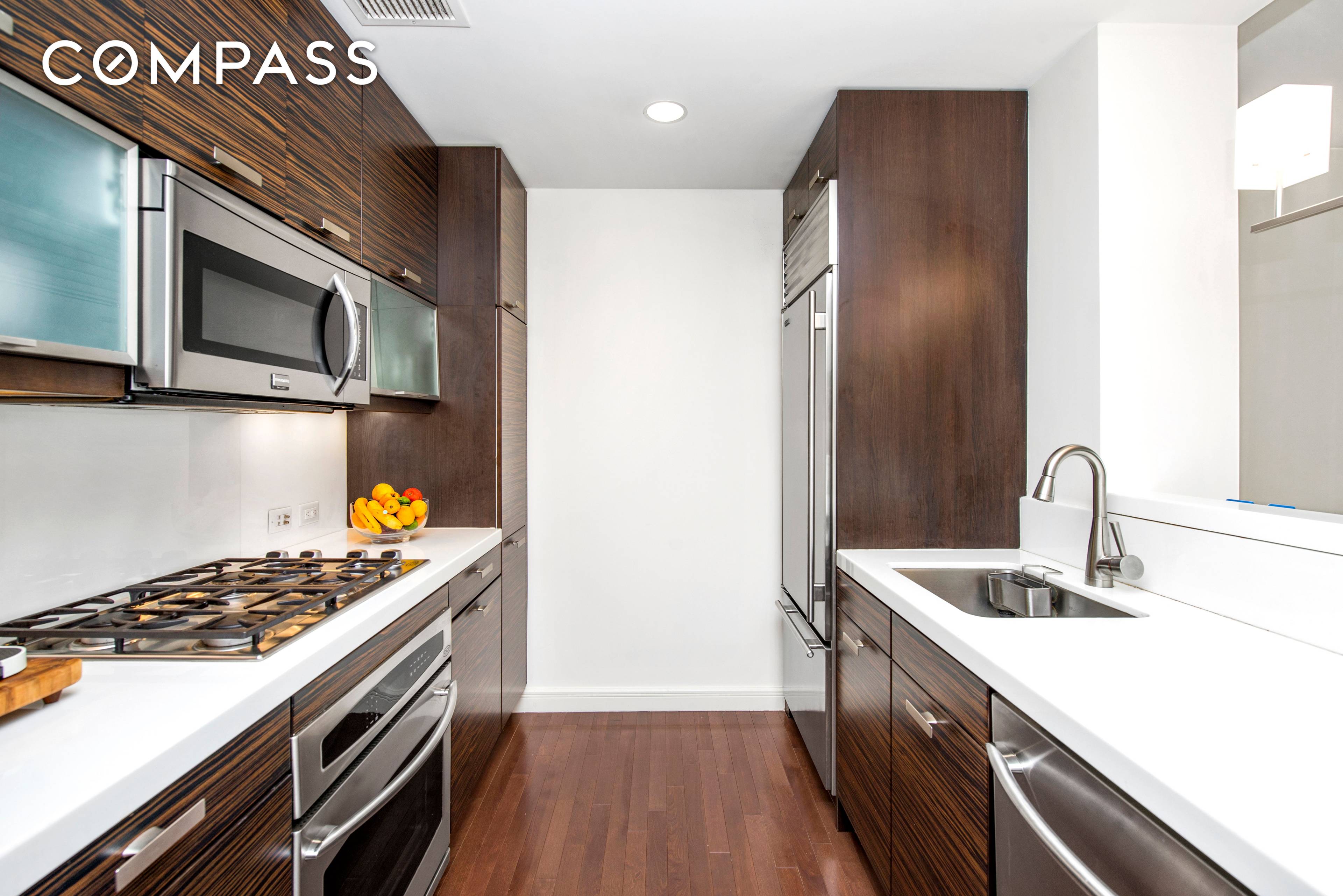 This South facing 2 bedroom features hardwood floors, 3 Zone Central Heat AC, Washer Dryer, a large open chef s kitchen with etched glass cabinetry, crystalline countertops, stainless steel appliances, ...