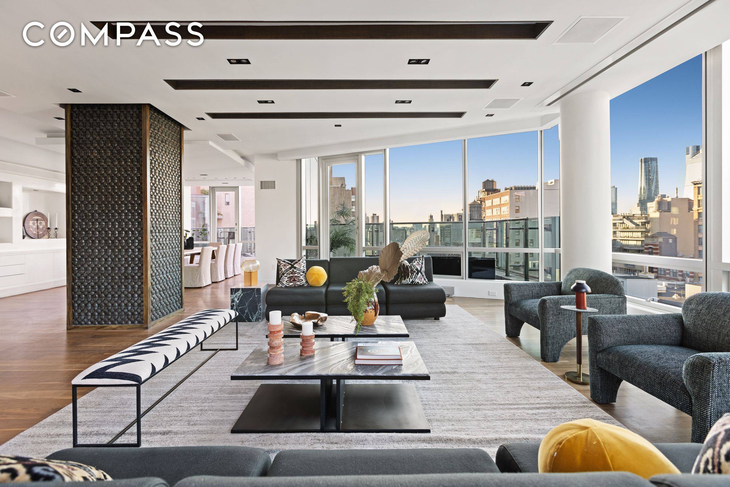 This expansive Penthouse, occupying an entire floor, offers breathtaking panoramic views of the city from every direction, with four remarkable terraces providing private outdoor sanctuaries.