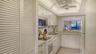 Laundry closet on the left
