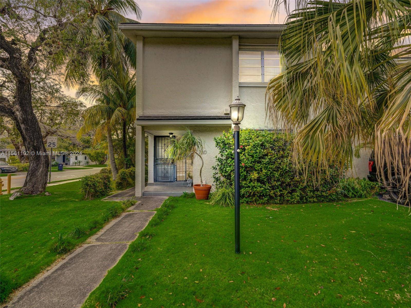 Introducing a charming corner lot townhome condo in South Miami.