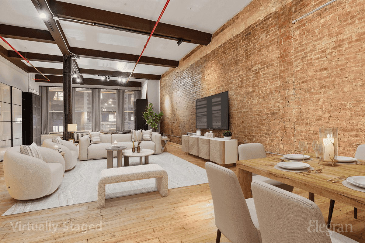 This rarely available classic LIVE WORK loft is in a landmarked building with approx 4000 SF of open space and soaring 12 beamed ceilings.