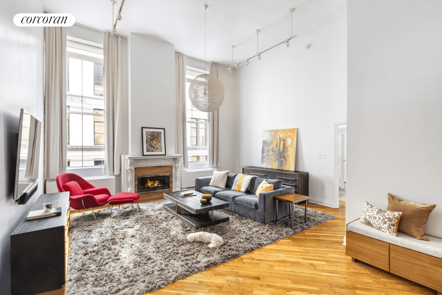 Chelsea loft with soaring 15 foot ceilings and renovated kitchen and baths.