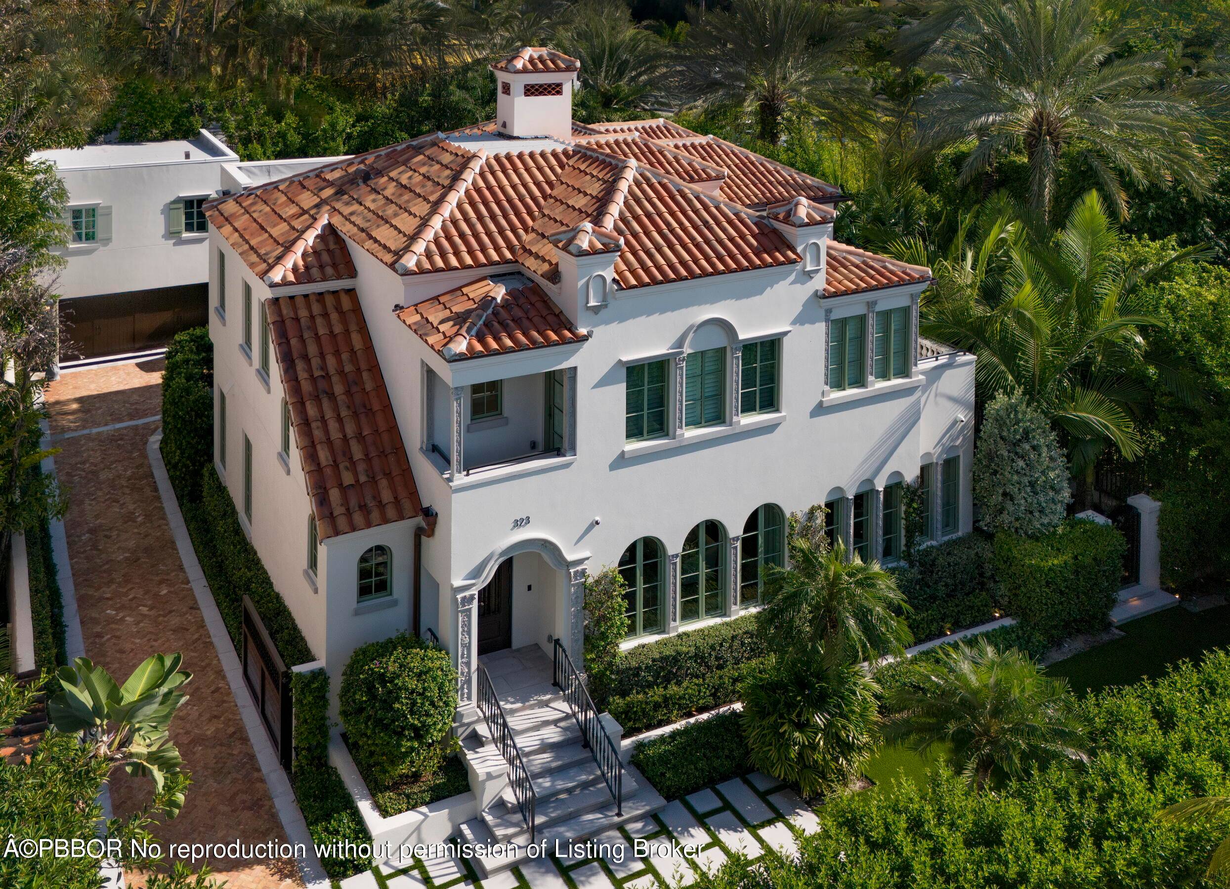 Welcome to 323 Chilean Avenue ; an incomparable masterpiece located in the tranquil heart of Palm Beach Town.