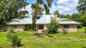 Custom-built one-owner estate on nearly two private acres.