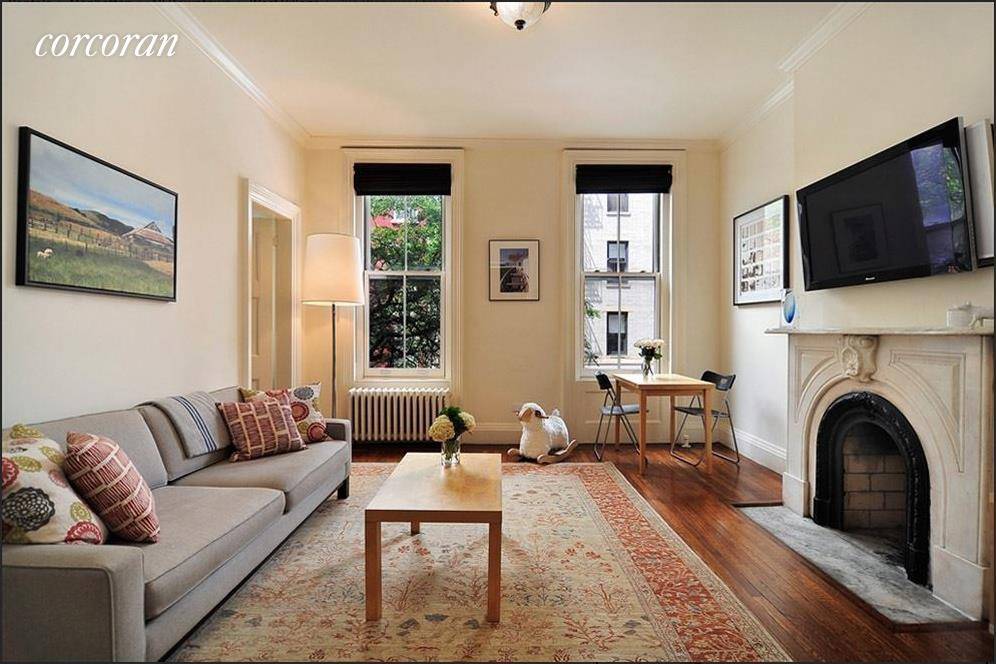22' x 10' PRIVATE TERRACE One flight up to this full floor home with 10 foot ceiling heights in a wide townhouse on Bleecker and Perry Streets in the heart ...