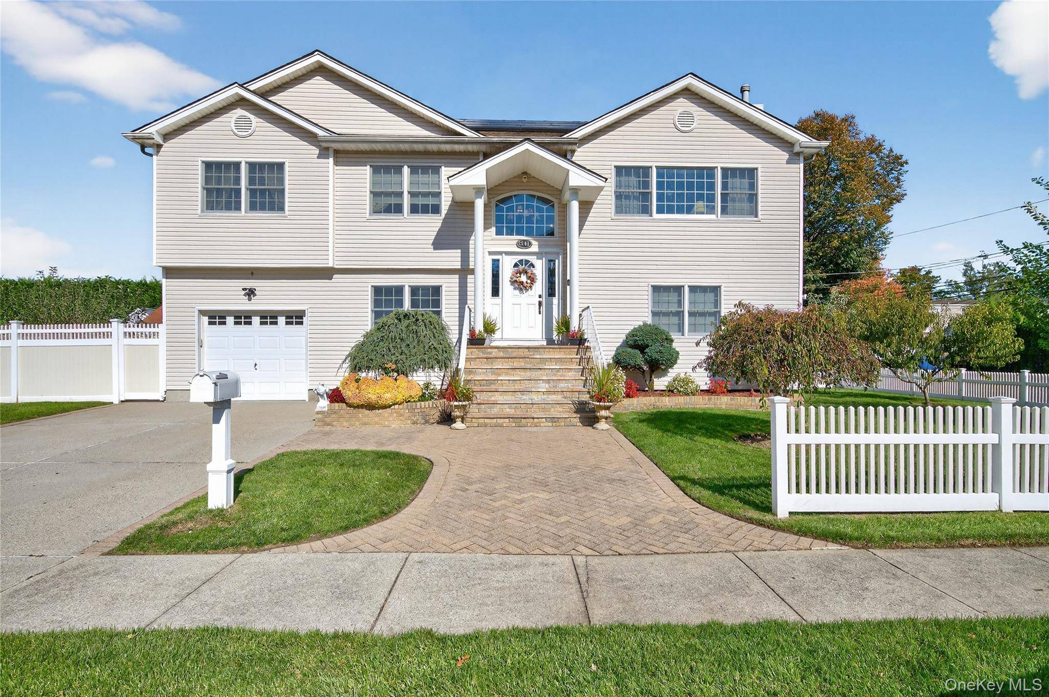 A unique home in the East Meadow Schools featuring three full floors of living space, 2508 square feet without the basement, 1 car attached garage, 2 zone gas heat, 2 ...
