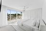 Bedroom featuring access to outside, light wood finished floors, and ceiling fan