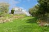 View of green lawn with stairway