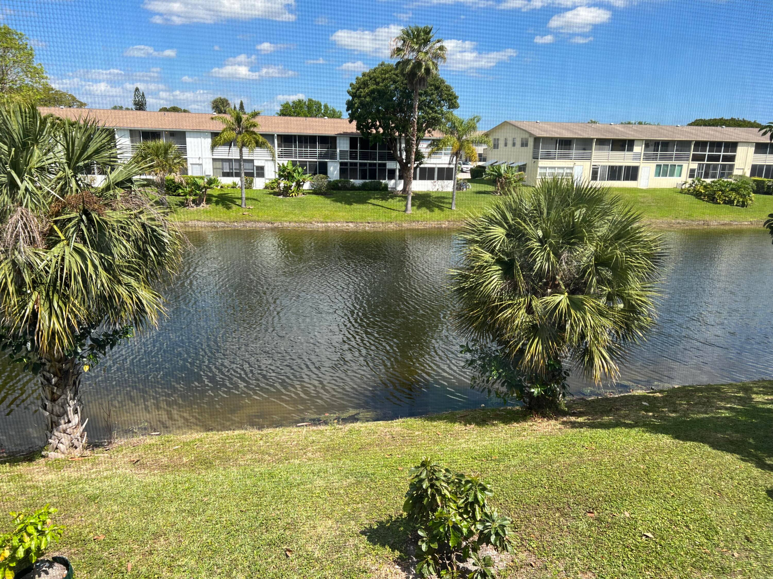 Great condo in 55 gated community Serene water view from screened in patio.