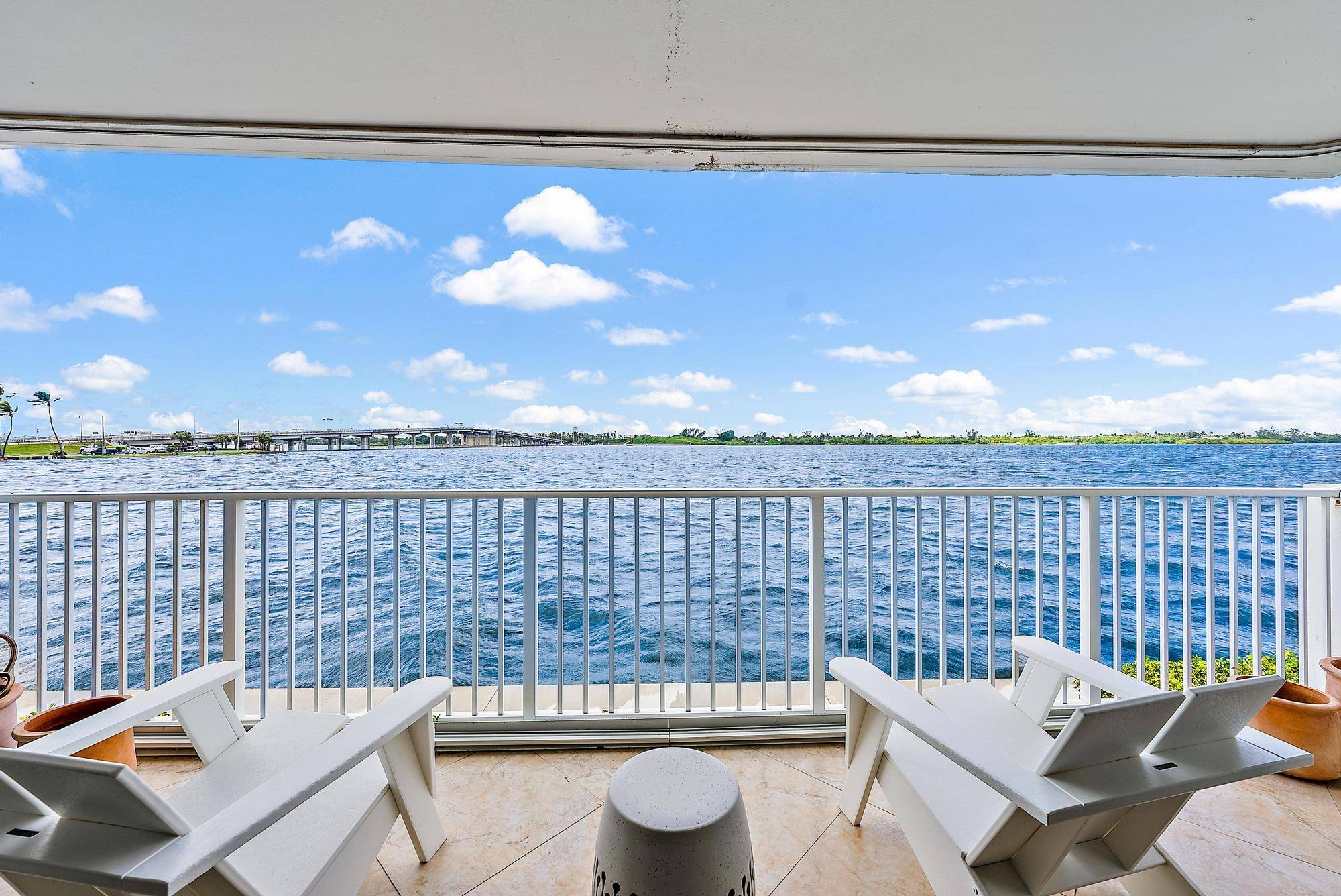 Rare, Direct Intracoastal Corner First Floor Unit in Palm Beach with thoughtful renovations throughout.