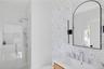 Full bathroom with a stall shower and vanity