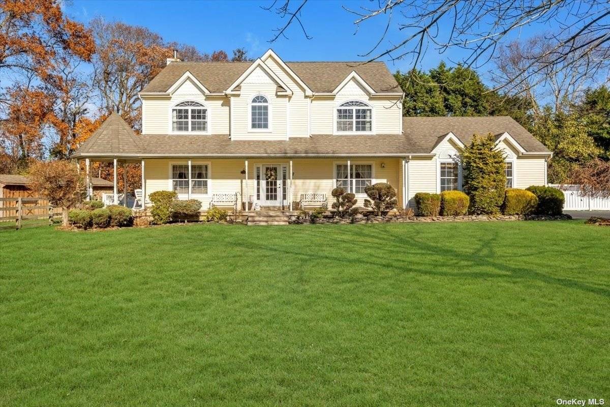 Welcome to your dream home on the North Fork of Long Island, nestled in the charming hamlet of Aquebogue.