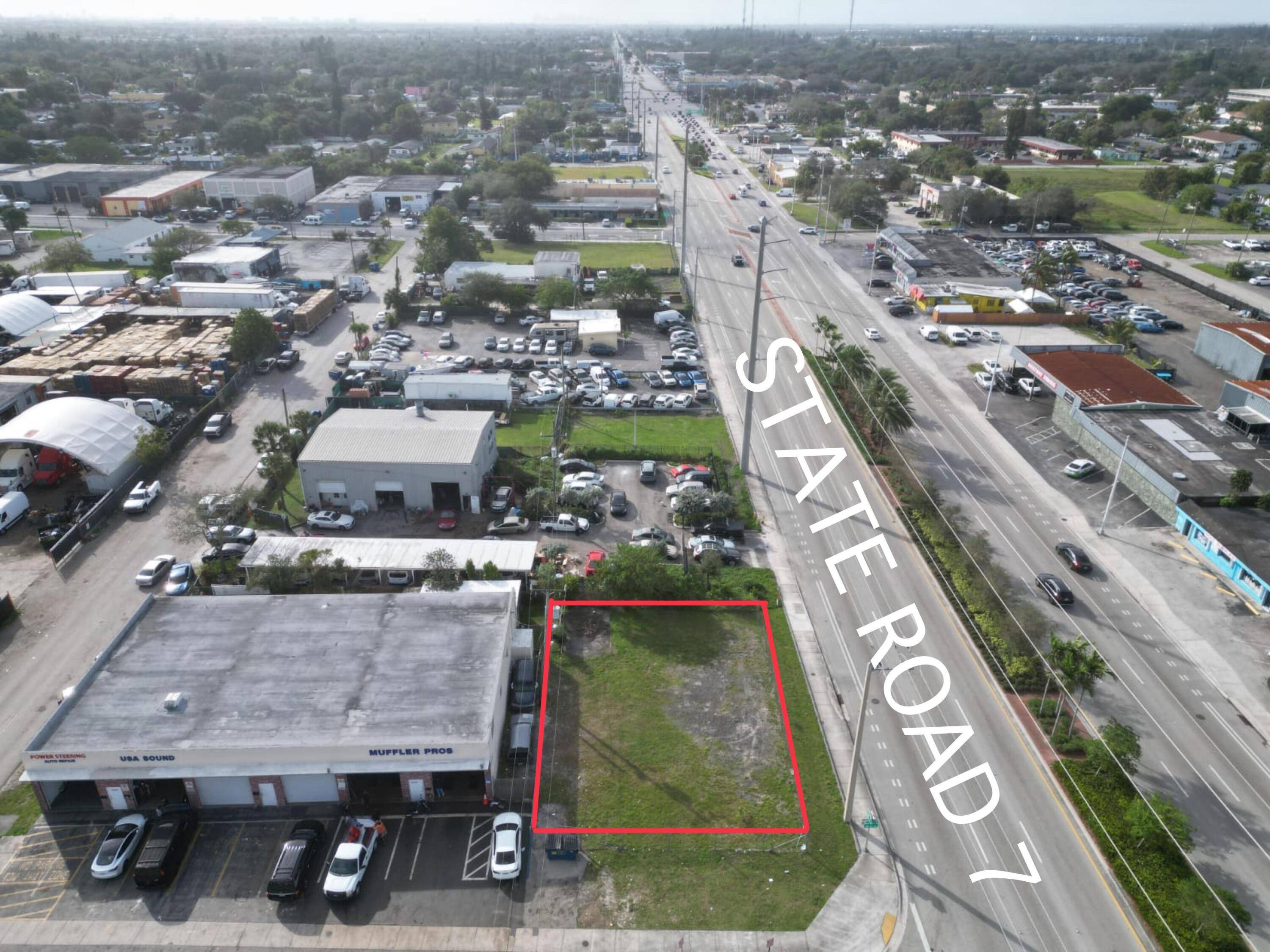 Explore the opportunities presented by this exceptional Gated 7, 200 square foot corner lot on State Rd 7, ideal for auto sales, a free standing retail structure, or an office ...