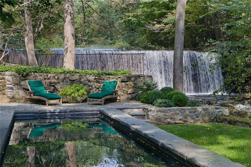 This magical six acre estate on the banks of North Salem's Titicus River offers a spectacular main house, guest studio, waterfall, gardens, a heated pool and walking trails with direct ...